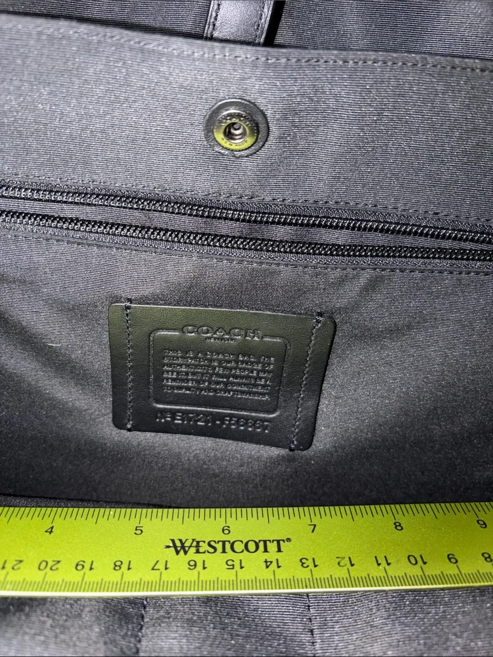 Coach Black Pebbled Leather Backpack with Front Pocket and Stripe Detail